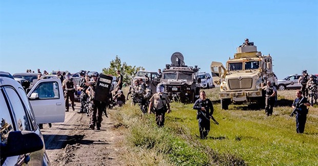 As Militarized Police Move In, Indigenous Peoples from Around the World Stand with Standing Rock