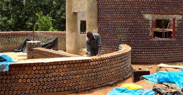 Nigerians Are Building Fireproof, Bulletproof, and Eco-Friendly Homes With Plastic Bottles and Mud