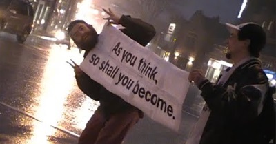 How to Shift Paradigms: Free Hugs and Conscious Sign Holding