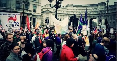 Building Communities of Dissent Around Social Injustices Caused by Neoliberalism