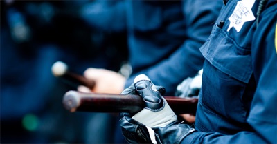 Former Police Chief: Put Down the Big Stick