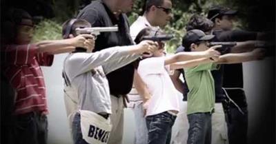 Watching These Kids Shooting Guns Makes Me Think Our Culture's Gun Fetish Might be a Problem