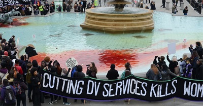 Trafalgar Square Runs Red with 'Blood' in Domestic Violence Cuts Protest