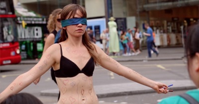 Why A Woman Stood in The Middle of London in Her Underwear and Asked People to Draw on Her