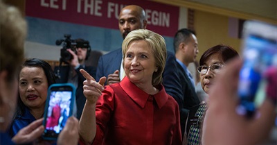 Hillary Clinton, Corporate America and the Democrats' Dilemma