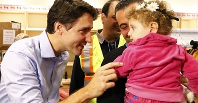 Canada's Prime Minister Justin Trudeau Greets Syrian Refugees Who Just Arrived in Toronto