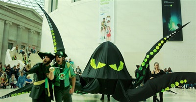 Anti-BP performers bring 40-foot sea monster into British Museum